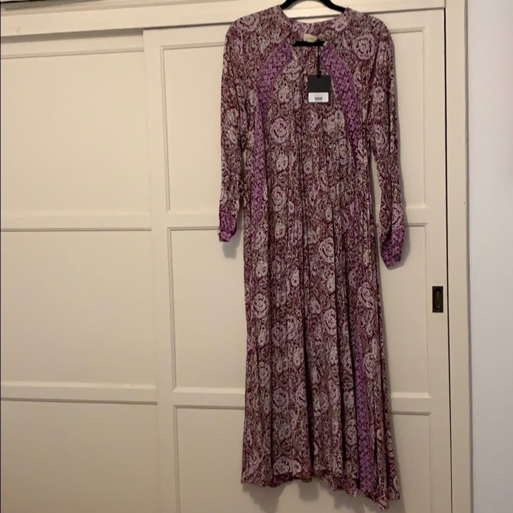 NEW WITH TAGS, NEVER WORN. An impulse buy.